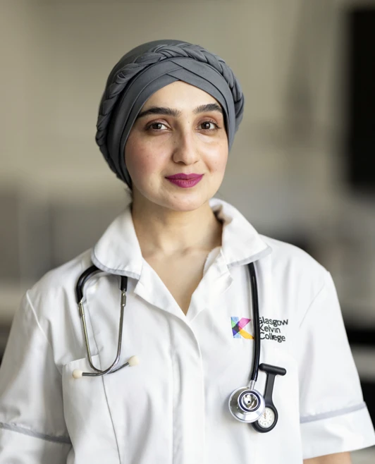 Portrait of a confident care student in uniform at Glasgow Kelvin College. Portrait of a confident care student in uniform at Glasgow Kelvin College.